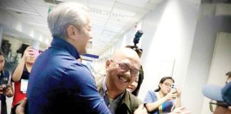 Department of Interior and Local Government secretary Jonvic Remulla warmly embraces Region 6 director Juan Jovian Ingeniero upon his safe arrival at the Ninoy Aquino International Airport - Terminal 3 in Pasay City on Saturday morning, June 21, following the delegation’s evacuation from Israel amid rising tensions with Iran. DILG PHOTO