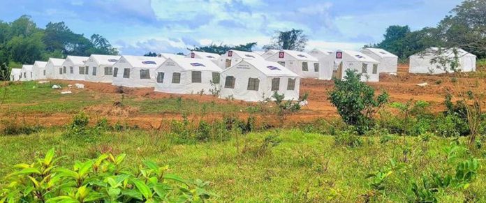 Rows of family tents stand ready at the designated Kanlaon volcano evacuation site in Himamaylan City, Negros Occidental. While fully equipped, the tent city remains unoccupied as officials prioritize relocating displaced La Castellana town residents to nearby areas such as La Carlota City to maintain access to livelihoods and essential services. CIVIL DEFENSE WESTERN VISAYAS PHOTO