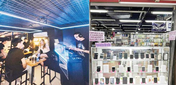 mai-business-wage-copy Small businesses such as bars and gadget shops in Iloilo, like those pictured here, are among the many small enterprises grappling with the potential impact of a proposed P200 daily wage hike — a move they fear could lead to higher operating costs, layoffs, or closures. MA. THERESA LADIAO/PN