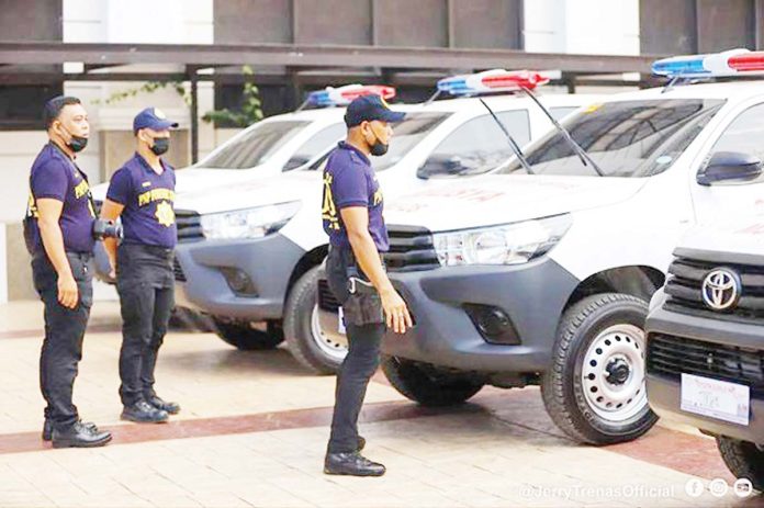 mai-police-copy Policemen inspect newly acquired patrol vehicles during a turnover ceremony conducted by the Iloilo City Government for the Iloilo City Police Office in April 2023. The initiative is part of the city’s continuing efforts to strengthen police mobility, which later included the turnover of multiple SWAT vans in 2024. PHOTO COURTESY OF JERRY TREÑAS OFFICIAL FACEBOOK PAGE