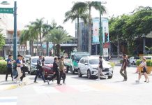 Strong traffic law enforcement in private townships mulled amid 300+ crashes Pedestrians cross a busy intersection at Iloilo Business Park, one of Iloilo City’s major private developments now being eyed for stricter traffic law enforcement through the proposed deputization of township security personnel. AJ PALCULLO PHOTO