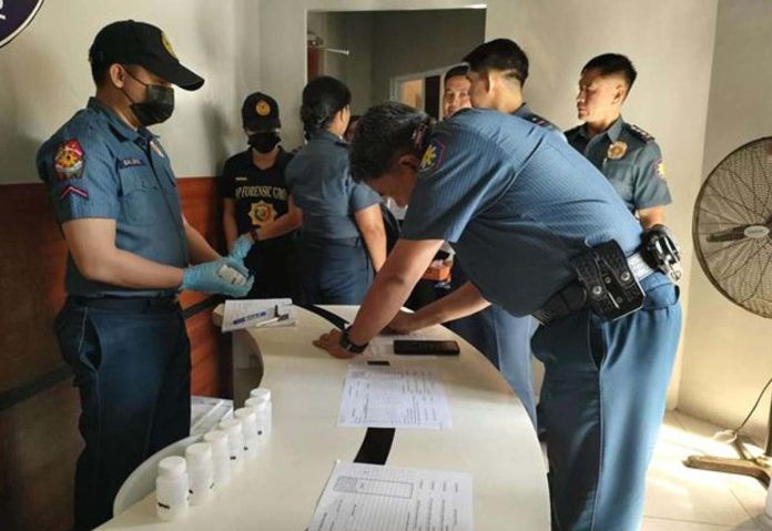mai_surprise_test Senior officers of the Police Regional Office 6 (PRO-6) sign in and submit specimens during a surprise drug testing held at Madia-as Hall, Camp General Martin Delgado in Iloilo City on June 27, 2025. The initiative, led by PRO-6 director Police Brigadier General Josefino Ligan, is part of the intensified internal cleansing campaign to ensure a drug-free police force. AJ PALCULLO PHOTO