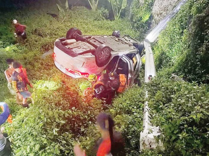 This car overshot a sharp curve and overturned in Barangay Man-it, Passi City, Iloilo past 4 a.m. on Wednesday, June 11, 2025. Police said a 20-year-old man was declared dead on arrival at the hospital and his three companions were injured. PASSI CITY FIRE STATION PHOTO