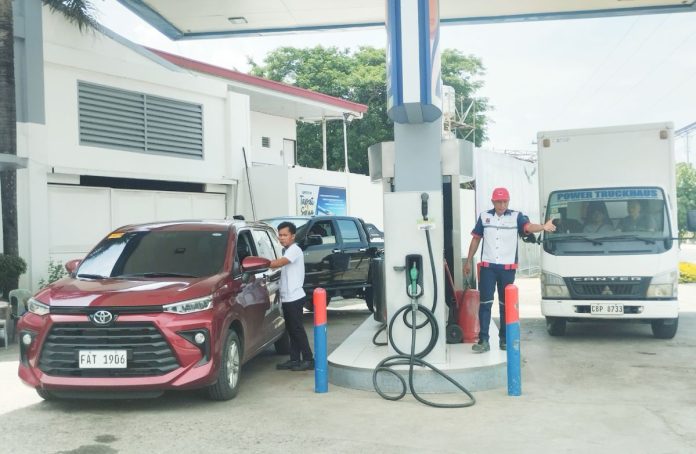 rollback Vehicles stop for refueling at Petron gasoline station in Pavia, Iloilo on Monday, June 30, 2025. Oil companies will slash diesel and gasoline prices by P1.80 and P1.40 per liter, respectively, beginning today, July 1. PN PHOTO