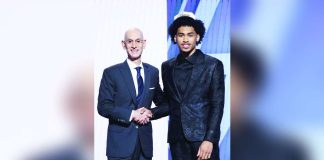 San Antonio Spurs rookie Dylan Harper shake hands with NBA commissioner Adam Silver following his draft selection. PHOTO BY SAN ANTONIO SPURS