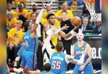 Indiana Pacers’ Bennedict Mathurin goes up for a layup in between Oklahoma City Thunder defenders. GETTY IMAGES