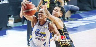 Magnolia Chicken Timplados Hotshots’ Rafi Reavis battles TNT Tropang 5G's John Paul Erram for the rebound. PBA IMAGES