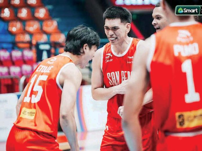 sports_Aklanon_copy_resized Aklanon Zedjay Etulle celebrates with his San Beda University Red Lions teammates after scoring the game-winning basket. PHOTO COURTESY OF SMART SPORTS