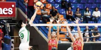 College of St. Benilde Lady Blazers’ Aya Densing drops the ball against the defense of Mapua University Lady Cardinals. PHOTO COURTESY OF NCAA/GMA SPORTS