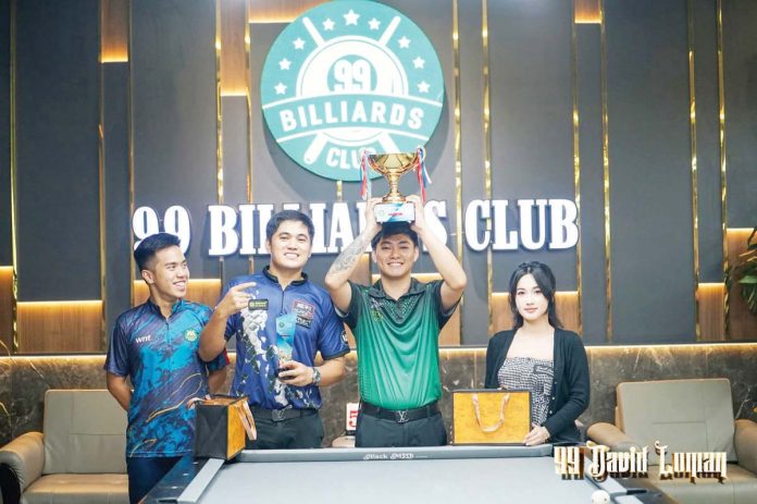 Bacolodnon Johann Chua raises his trophy after ruling the 9-Ball 99 David Loman Cup. Contributed Photo. CONTRIBUTED PHOTO