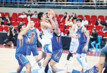 Rain or Shine Elasto Painters’ Jhonard Clarito attempts to score against the defense of NLEX Road Warriors’ Brandon Ramirez. PBA PHOTO