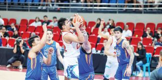 Rain or Shine Elasto Painters’ Jhonard Clarito attempts to score against the defense of NLEX Road Warriors’ Brandon Ramirez. PBA PHOTO