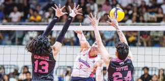 Creamline Cool Smashers' Sheena Toring scores against the defense of Akari Power Chargers' Celine Domingo and Christine Joy Soyud. PVL PHOTO