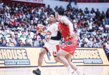 Barangay Ginebra San Miguel Kings’ Jayson David looks to attack the defense of Rain or Shine Elasto Painters' Francis Escandor. PBA PHOTO