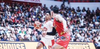 Barangay Ginebra San Miguel Kings’ Jayson David looks to attack the defense of Rain or Shine Elasto Painters' Francis Escandor. PBA PHOTO