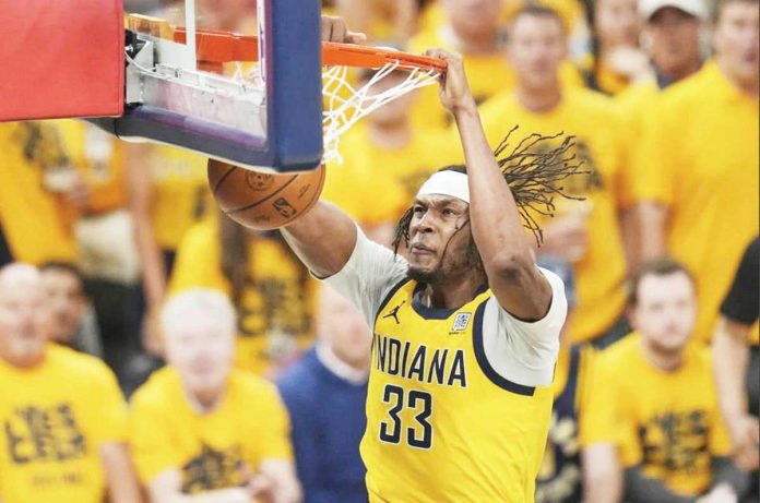 sports_Indiana Indiana Pacers center Myles Turner soars for a two-handed dunk. AP