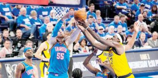 Oklahoma City Thunder's Isaiah Hartenstein (55) and Indiana Pacers' Myles Turner (33) and Pascal Siakam (43) battle for the rebound. PHOTO BY KYLE TERADA-IMAGN IMAGES