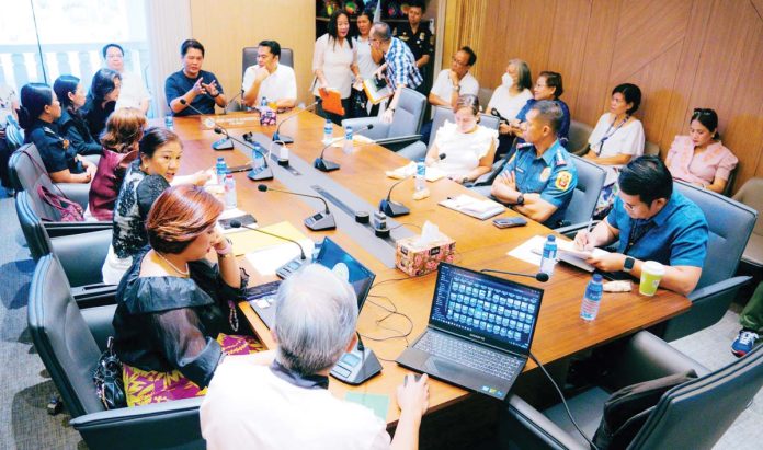2-Bacolod-leaders-order-immediate-action-on-flooding-copy Lone District Congressman Alfredo Abelardo Benitez and Mayor Greg Gasataya convened an emergency meeting with the City Disaster Risk Reduction and Management Council (CDRRMC) and key response agencies on July 14 at the City Mayor’s Office in the Bacolod City Government Center to address the flooding concerns in the city. PHOTO COURTESY OF MAYOR GREG GASATAYA/FACEBOOK