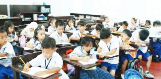 Students begin writing on their new notebook during the first day of school for Academic Year 2025-2026 at Santiago Elementary School in Barangay Santiago, City of General Trias, Cavite on June 16, 2025. Some 27 million students nationwide have returned to their classes. PNA