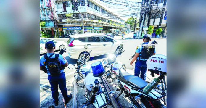 LTO copy_superimposed Quezon City Police District mobile patrol team stands guard at the corner of E. Rodriguez Sr. Avenue. Philippine National Police chief Gen. Nicolas Torre III vowed swift and responsive public service. For its part, the Land Transportation Office has reminded motorists to keep the roadworthiness of their vehicles as it plans to intensify a crackdown on unsafe and unfit units nationwide. PNA