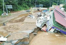 At least 14 dead in South Korea floods, landslides Strong floodwaters swept through southeastern South Korea on Sunday. BBC