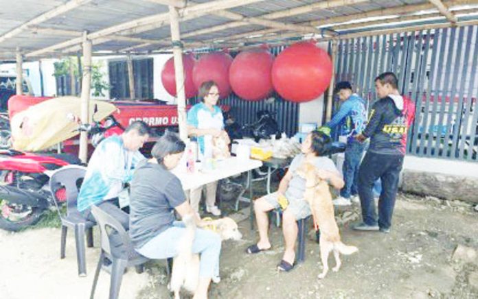Still_displaced_copy_resized A veterinarian attends to pets brought by evacuees during a free consultation service at an evacuation center in Barangay Sooc, Arevalo, Iloilo City on July 24, 2025. The initiative is part of the Iloilo City government’s continuing support for the 4,469 families still sheltering in 22 evacuation centers due to persistent flooding. PHOTO FROM MAYOR RAISA TREÑAS FACEBOOK PAGE