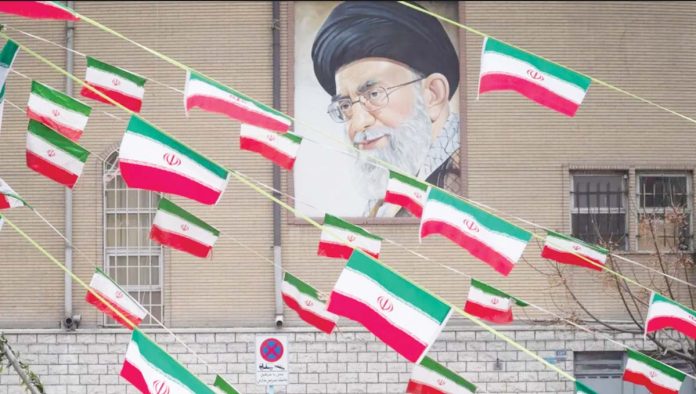 UK A mural of Iran’s Supreme Leader Ayatollah Ali Khamenei is seen on the side of a building in Azadi avenue with reams of Iranian national flags hanging in the foreground, in Tehran. GETTY IMAGES