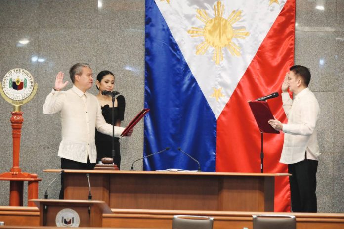 Uphold_copy_resized Senate President Francis Escudero (right) administers the oath of newly elected Majority Leader Sen. Joel Villanueva during the first regular session of the 20th Congress on July 28, 2025. Escudero urged senators to comply with the Supreme Court’s unanimous ruling that nullified the impeachment complaint against Vice President Sara Duterte-Carpio.