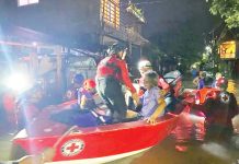 Personnel of the Philippine Red Cross Negros Occidental-Bacolod City Chapter’s Emergency Response Unit conduct rescue operation in Purok Isla, Barangay Villamonte, Bacolod City after residents experienced flooding, on Friday night, July 11, 2025. Philippine Red Cross NegOcc-Bacolod City Chapter PHOTO