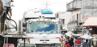 A garbage truck of IPM-Construction and Development Corp. collects garbage across Bacolod City. PNA BACOLOD FILE PHOTO