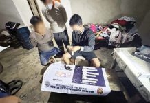 Officers of the Balasan Municipal Police Station apprehended alias “Putot” (left) in a drug buy-bust operation in Barangay Salong, Balasan, Iloilo on Monday night, July 14, 2025. IPPO PHOTO