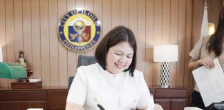 Mayor Inday Raisa Treñas flashes a smile as she signs key documents during her first week in office.