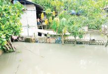 Extreme high tide triggers flood alert in Iloilo City; CDRRMO warns: More surges likely amid erratic weather The Iloilo City Government placed barangays in Molo, Jaro, and Lapuz districts under close observation due to their susceptibility to tidal flooding. Photo shows the flooded area in Barangay Tagbak, Jaro on Monday, July 21. K5 NEWS FM ILOILO PHOTO