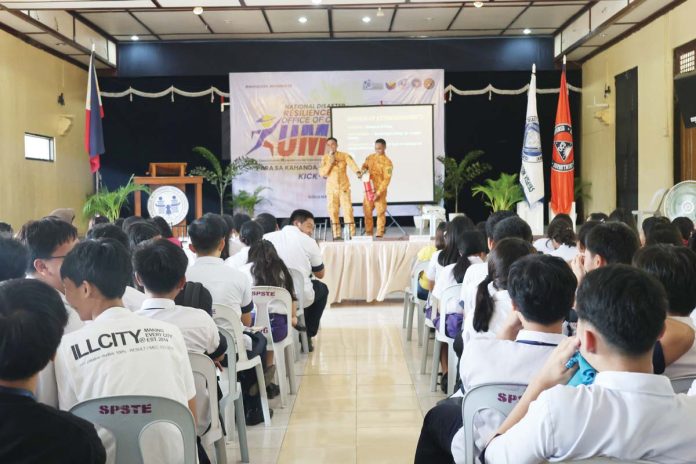 ime-resilience Personnel from the Bureau of Fire Protection – La Paz Fire Station in Iloilo City demonstrate basic fire safety techniques to students and guests during the kickoff ceremony of the National Disaster Resilience Month 2025 held at Iloilo National High School, La Paz district, Iloilo City on July 4. PHOTO FROM CIVIL DEFENSE WESTERN VISAYAS FACEBOOK