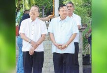 Atty. Edgar Gil (left) stands beside then-Iloilo City mayor Jerry Treñas during a flag-raising ceremony. Gil, a long-serving City Legal Officer and respected public servant, passed away on July 3, 2025, just a day after his reappointment was confirmed. MIGUEL TREÑAS FACEBOOK PAGE