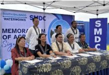 (From left) Barangay Buhang Captain Ma. Jenny Celiz, South Balibago Waterworks president Cristina Isabelle P. Alejandro, Iloilo City Councilor Nene DeLa Llana, SMDC assistant vice president for Project Development and Management Neil Brian J. Serantes, Barangay Balabago Captain Antonio Jacoba. (Standing from left) Redenne O. Tadeo, SMDC Pre-Operations and Technical Group head, Dareen Carl P. Navarro, SMDC Project Development and Management manager, and Rommel YU, SMDC VP for Engineering VISMIN, pose for a photo after signing the Memorandum of Agreement to provide reliable water supply to Glade Residences in Jaro district.