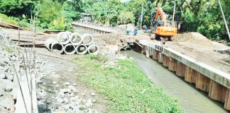 Ongoing drainage and slope protection works in Barangay Tagbak, Jaro, Iloilo City — cited as a possible contributing factor to recent flooding due to construction delays and incomplete downstream infrastructure.