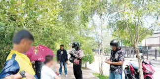 Anti-smoking enforcers apprehend violators caught puffing cigarettes in a smoke-free zone, as Iloilo City intensifies its crackdown under a reconstituted task force. Over 4,200 violators have been nabbed in just the first half of 2025. ICAST FACEBOOK PAGE