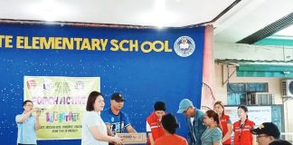 Mayor Raisa Treñas leads the distribution of relief goods to families evacuated due to torrential rains and flooding over the weekend at a designated evacuation center in Iloilo City. Data from the City Social Welfare and Development Office showed 34 impacted barangays, with Jaro district bearing the brunt at 17 affected villages, followed by Mandurriao district with eight barangays.