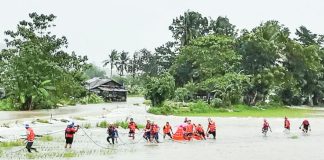 Personnel of the Coast Guard District Southern Visayas assisted in evacuation operations in Kabankalan City, Negros Occidental amid continuous rains that raised flooding concerns in the area. COAST GUARD DISTRICT SOUTHERN VISAYAS/FB PHOTO