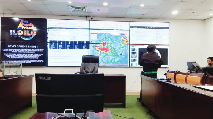 Personnel at the Provincial Disaster Risk Reduction and Management Office (PDRRMO) in Iloilo closely monitor weather bulletins and rainfall radar data, as intensified habagat rains — enhanced by tropical storms “Dante” and “Emong” — affect several towns across the province. Over 3,000 individuals have been impacted by the adverse weather.