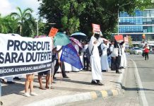 Protesters in Iloilo City hold a banner demanding the prosecution of Vice President Sara Duterte-Carpio during a rally outside the Iloilo Provincial Capitol on July 28, 2025, coinciding with President Ferdinand Marcos Jr.’s State of the Nation Address. NELJOY N. GALIGAO/PN