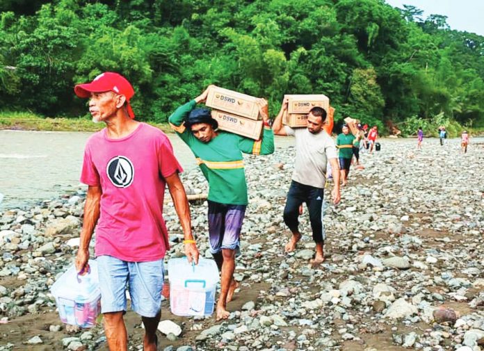 neljoy_asssitance1_copy_resized Department of Social Welfare and Development – Region 6 personnel and local volunteers brave rough terrain and mobilize vehicles to deliver essential aid to habagat-affected families in Antique — one of the hardest-hit provinces in Western Visayas. DSWD-6 PHOTO