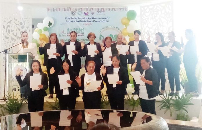 neljoy_nutri_resized New officers of the Provincial Nutrition Volunteers of Iloilo, Inc. take their oath of office during the launch of the 2025 Nutrition Month celebration at the Iloilo provincial capitol on July 7, 2025. The event marked the start of month-long activities promoting the right to food and nutrition as a central component of the province’s social justice agenda. NELJOY N. GALIGAO/PN