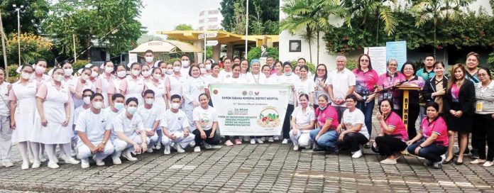 neljoy_nutrition_resized Hospital staff and personnel of Ramon Tabiana Memorial District Hospital in Cabatuan, Iloilo pose during the kick-off of the 51st Nutrition Month celebration on July 1, 2025, promoting the theme “Food and Nutrition Security, Maging Priority!” through wellness activities and advocacy for healthy, sustainable diets. BALITA HALIN SA KAPITOLYO PHOTO