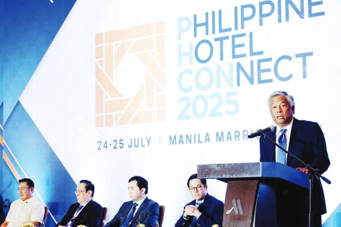 pagcor_resized Philippine Amusement and Gaming Corporation (PAGCOR) Chairman and CEO Alejandro H. Tengco (right) delivers his welcome address during the first day of the Philippine Hotel Connect 2025 conference which will run from July 24-25 at the Manila Marriot Hotel. Also in photo are TIEZA Chief Operating Officer Mark Lapid, Philippine Hotel Owners Association President Arthur Lopez, Tourism Undersecretary and Chief of Staff Shahlimar Hofer Tamano, and PHCon2025 Chairperson Francis Gotianun.