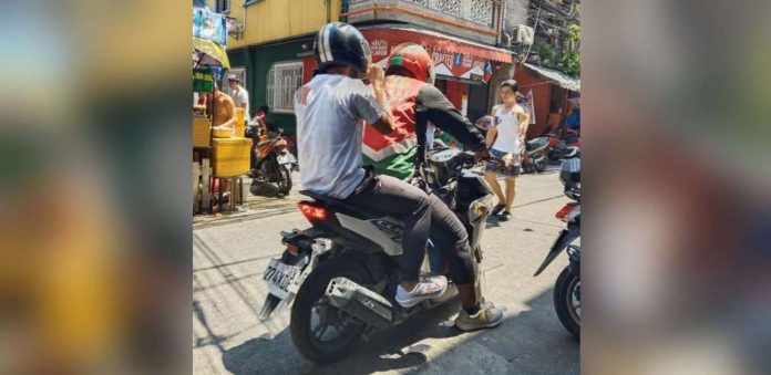 riders-pic Motorcycle taxi – or angkas – riders in Iloilo City are appealing to national legislators and regulatory agencies to fast-track the passage of enabling laws and establish clear guidelines to protect both passengers and riders alike. These motorcycle taxis lack franchises and are considered colorum. CONTRIBUTED PHOTO