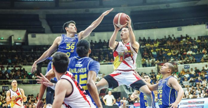 sports PBA copy Aklanon Kris Rosales of San Miguel Beermen tries to score against the defense of TNT Tropang 5G’s Calvin Oftana. PBA PHOTO