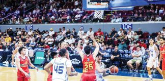 TNT Tropang 5G’s Henry Galinato tries to score against the defense of Rain or Shine Elasto Painters' Leonard Santillan. PBA PHOTO