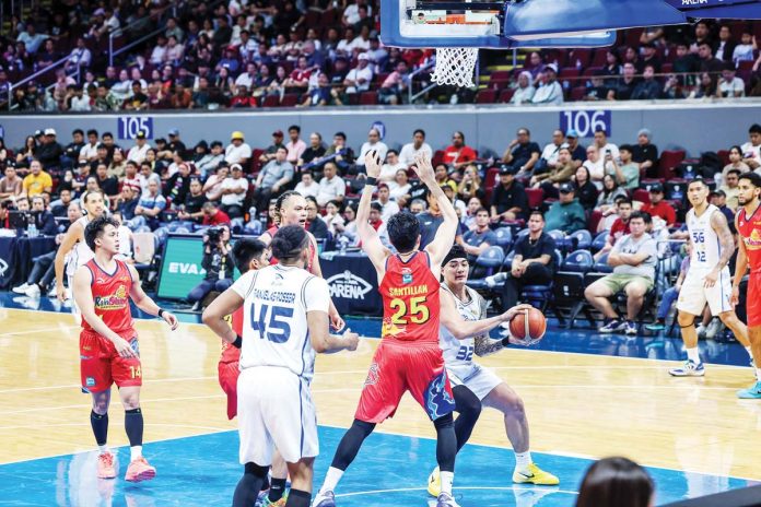 sports-injury-hit-copy TNT Tropang 5G’s Henry Galinato tries to score against the defense of Rain or Shine Elasto Painters' Leonard Santillan. PBA PHOTO